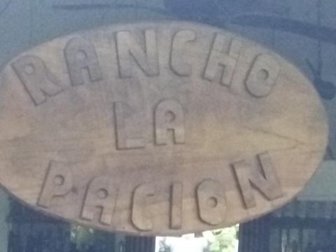 Casa Lima Bed and Breakfast 6-26-2019  This is the Rancho La Pacion Bar sign hanging in front of the bar.