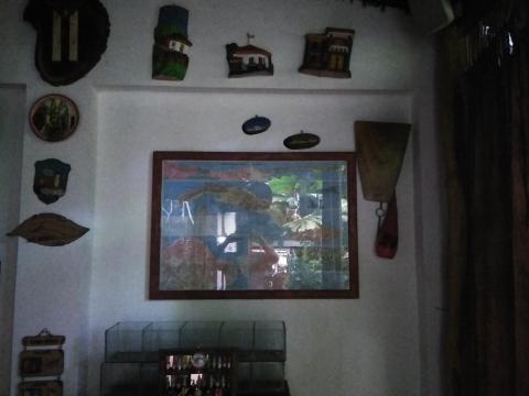 Casa Lima Bed and Breakfast 6-26-2019  This is the decorations on the wall basically in the lobby.  