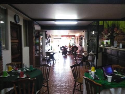 Casa Lima Bed and Breakfast 6-26-2019  This is looking from the jungle section to the front door which I call the Lobby or Restaurant of the Casa Lima Bed and Breakfast Hotel. 