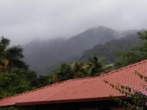 Looking at the mountains that are actually in front of the Restaurante La Casona Del Cafetal